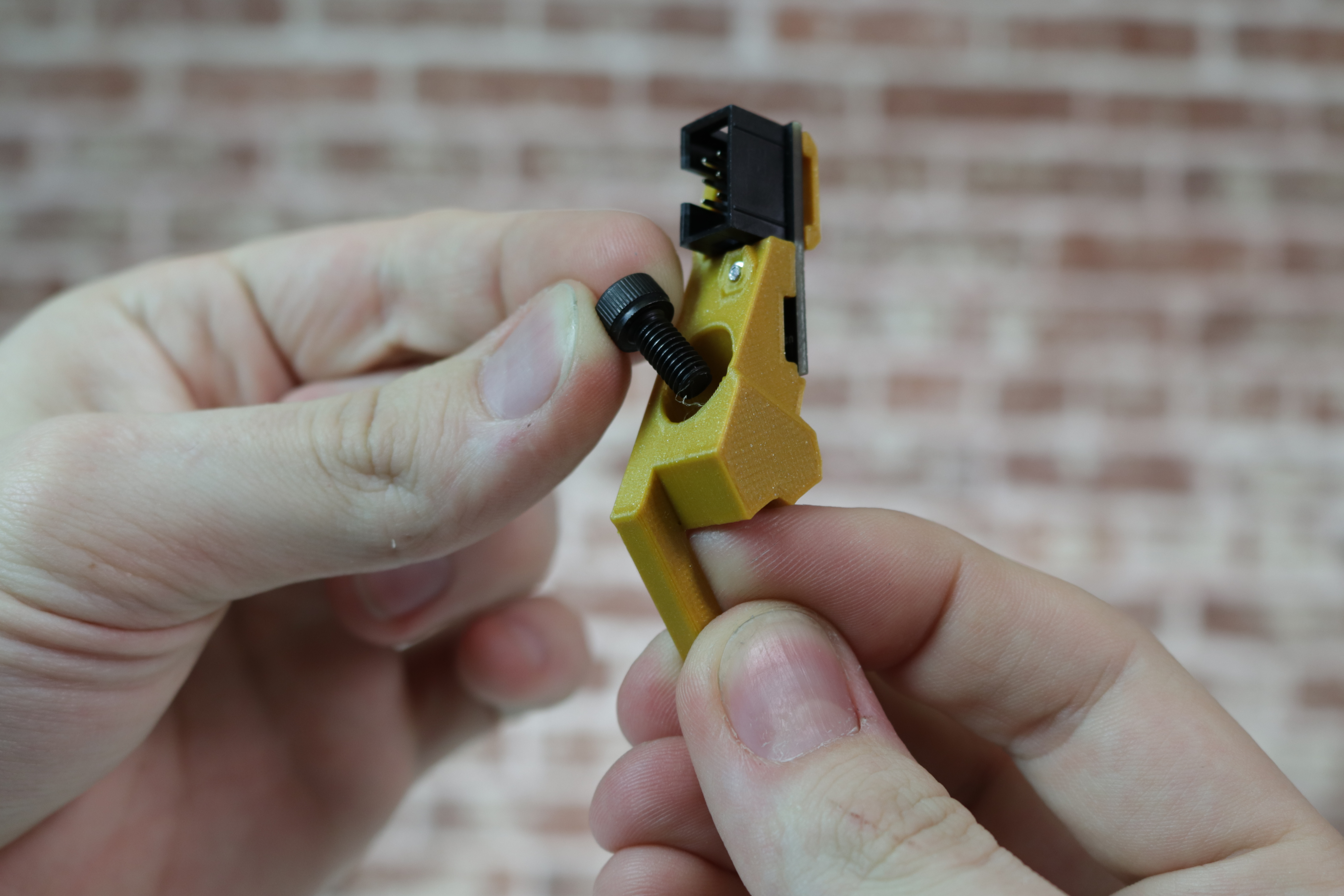 Inserting the M5x10mm screw