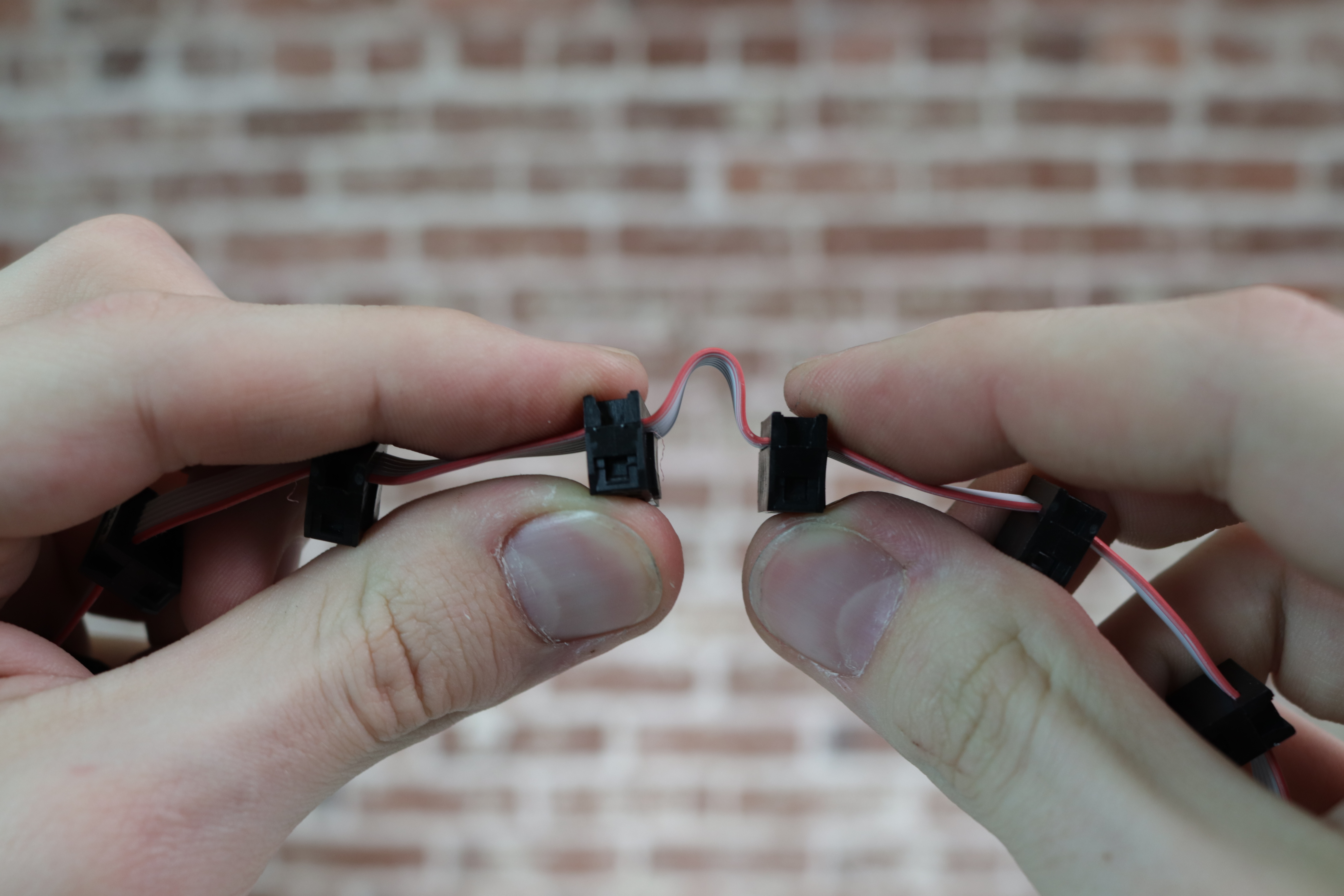 Bending the cable between two connectors