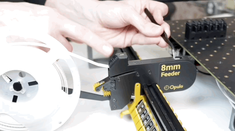 GIF Holding the forward button and pulling the film off the component tape